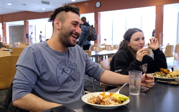 Students smiling in Holmes Dining Commons