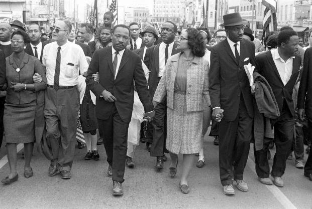 Martin Luther King Jr and supporters march