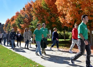 Fall open house tour on the quad with fall foliage in trees