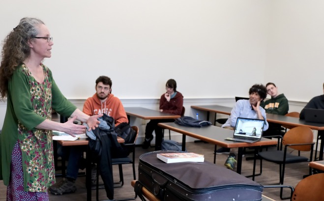 Michael Hoberman and guest lecturer in class with students