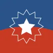 Juneteenth Flag. The flag uses the colors red, white and blue of the American flag. Featured prominently in the center of the flag is a bursting star.