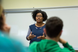 DeMisty Bellinger-Delfeld from English Studies teaching in front of a classroom