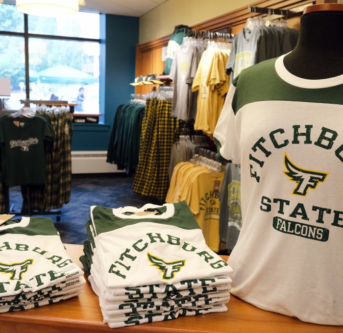 Bookstore with swag shirts and items hanging