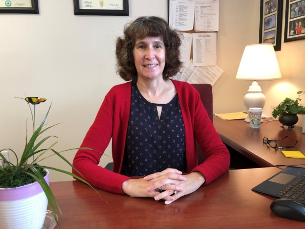 Audrey Pereira sitting at a desk