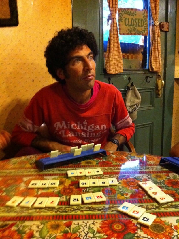 Michael Hoberman playing a game at a table.