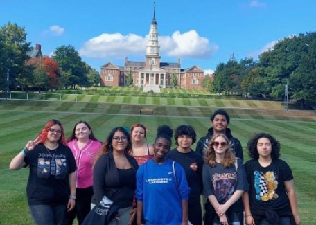 Senior upward bound students on a retreat outside