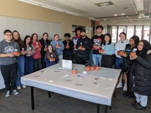 Environmental Sociology class in the library with seeds